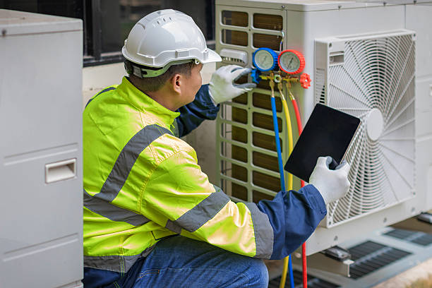 Professional Heat Pump Repair technician working in Danville, IL